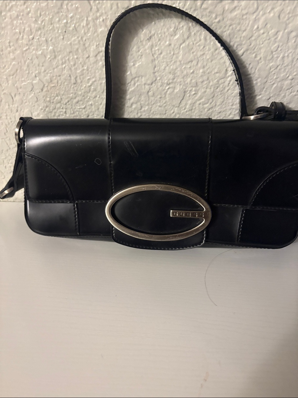 Guess Black Leather Clutch with Silver Oval Buckle